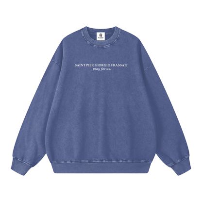 Blue sweatshirt with white text "Saint Pier Giorgio Frassati pray for us" on a blue background